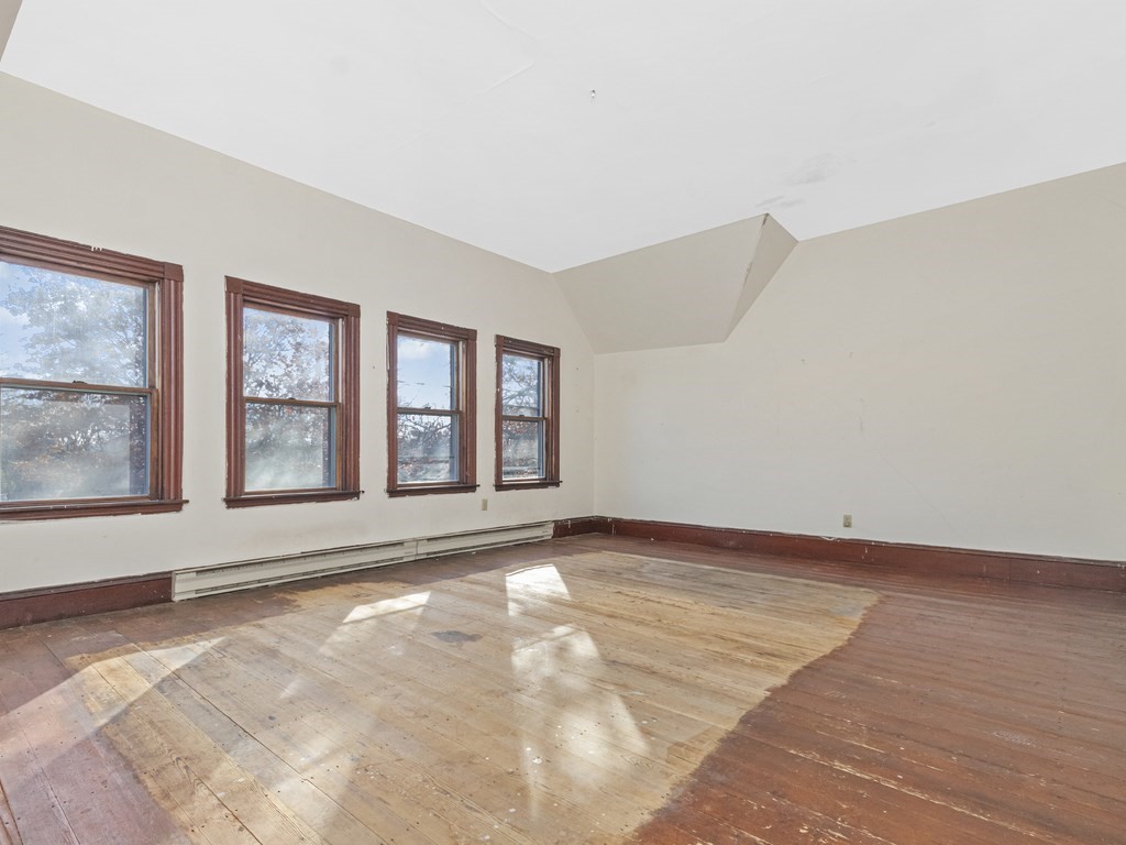 90 Addington Road, Unit 2 Brookline, MA 02445 - Photo 21 of 41 a view of an empty room with window