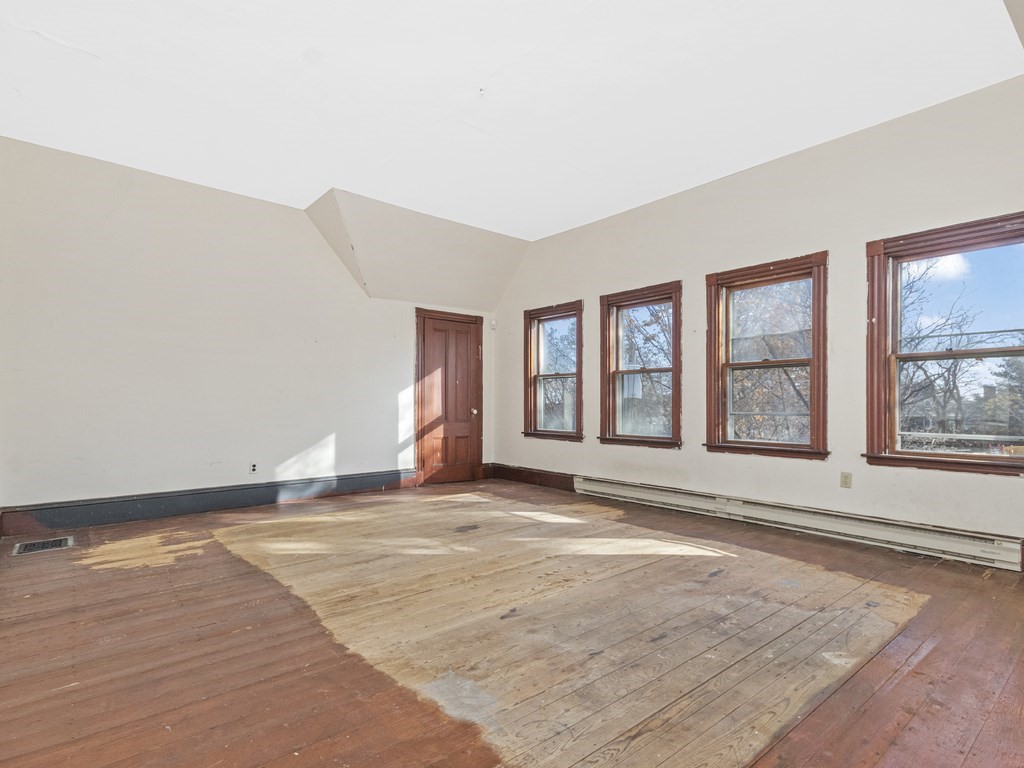 90 Addington Road, Unit 2 Brookline, MA 02445 - Photo 22 of 41 a view of an empty room with a window