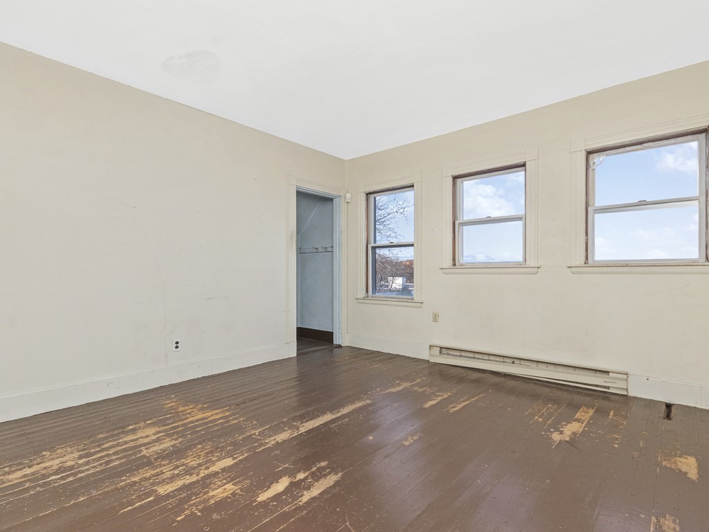 90 Addington Road, Unit 2 Brookline, MA 02445 - Photo 26 of 41 an empty room with windows