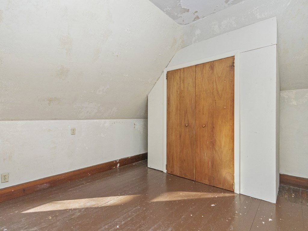 90 Addington Road, Unit 2 Brookline, MA 02445 - Photo 27 of 41 an empty room with an entryway