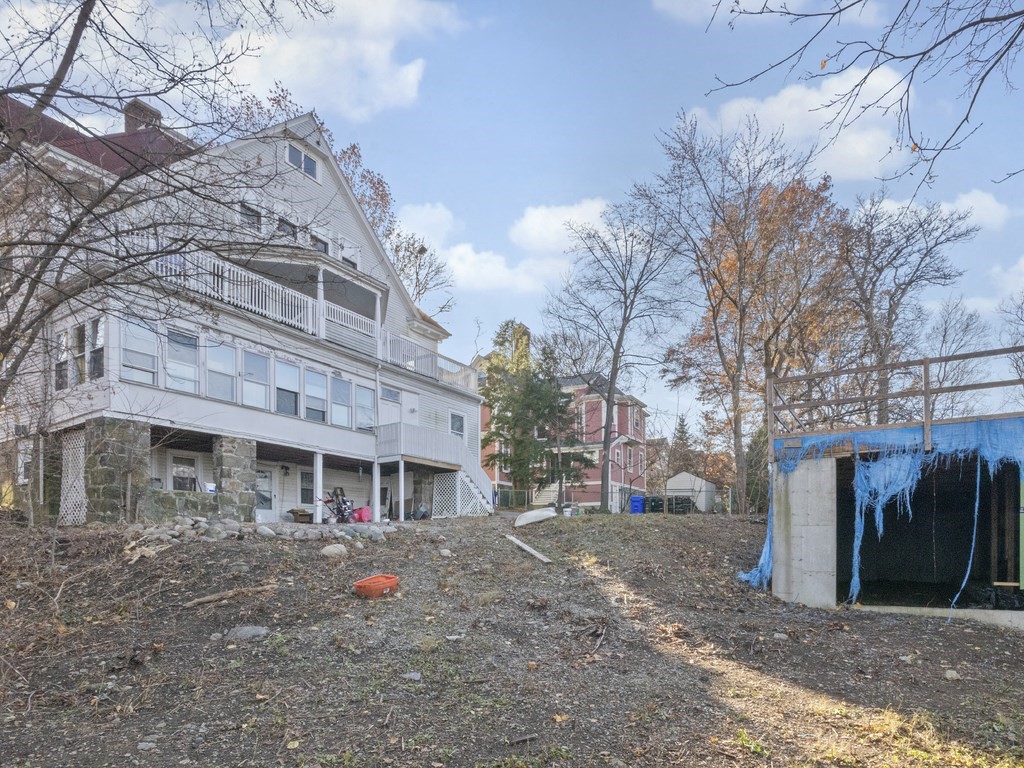 90 Addington Road, Unit 2 Brookline, MA 02445 - Photo 34 of 41 a front view of a building with large trees