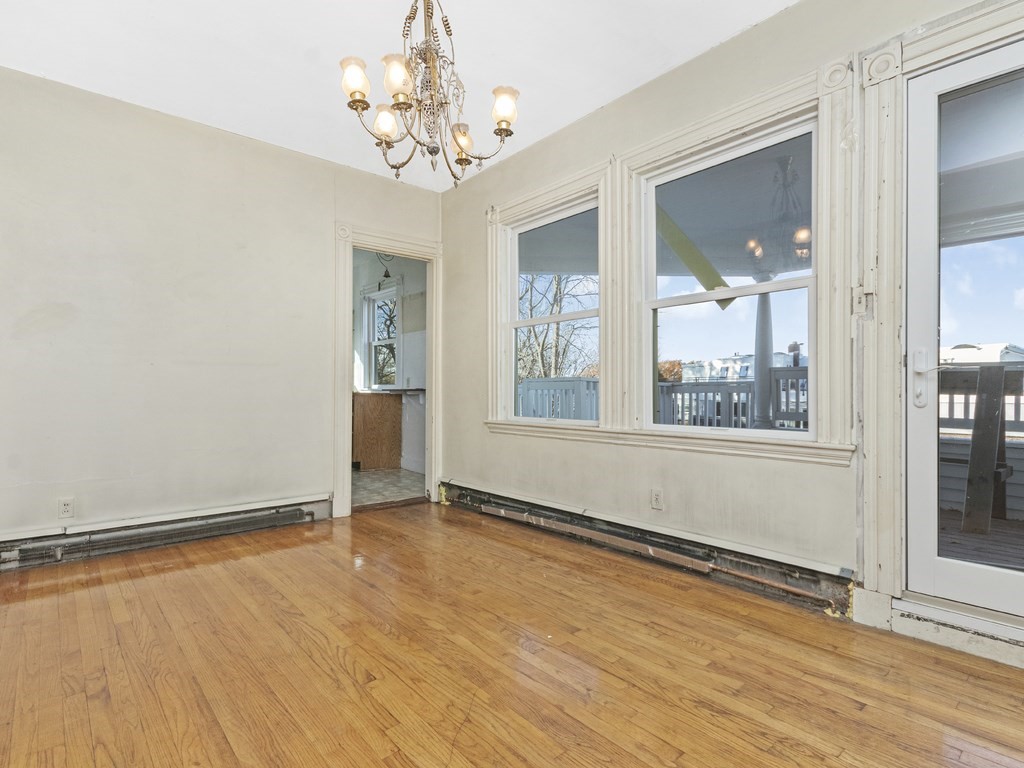 90 Addington Road, Unit 2 Brookline, MA 02445 - Photo 6 of 41 a view of an empty room with a window