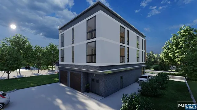 a view of a house with backyard and garden