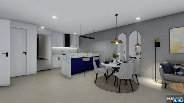 a kitchen with stainless steel appliances kitchen island granite countertop a sink and cabinets