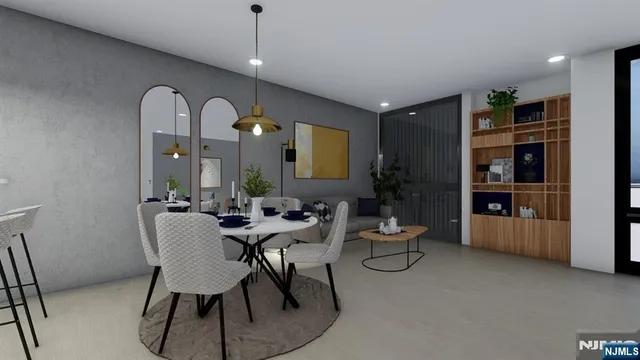 a view of a livingroom with furniture and gym equipment