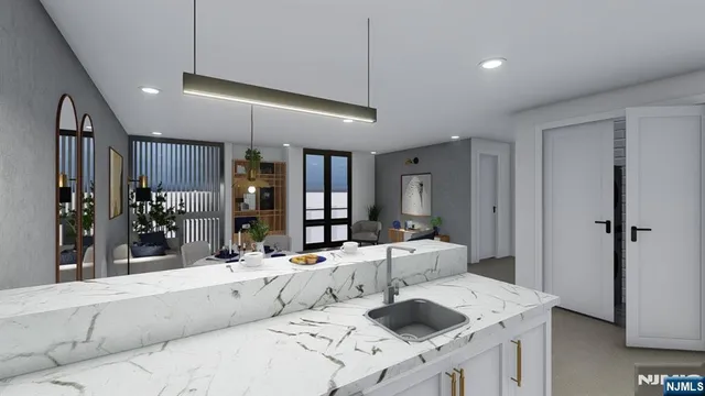 a living room with kitchen island granite countertop furniture and fireplace