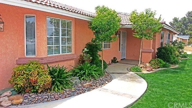 7396 Minstead Avenue Hesperia, CA 92345 - Photo 1 of 3 front view of a house with a yard