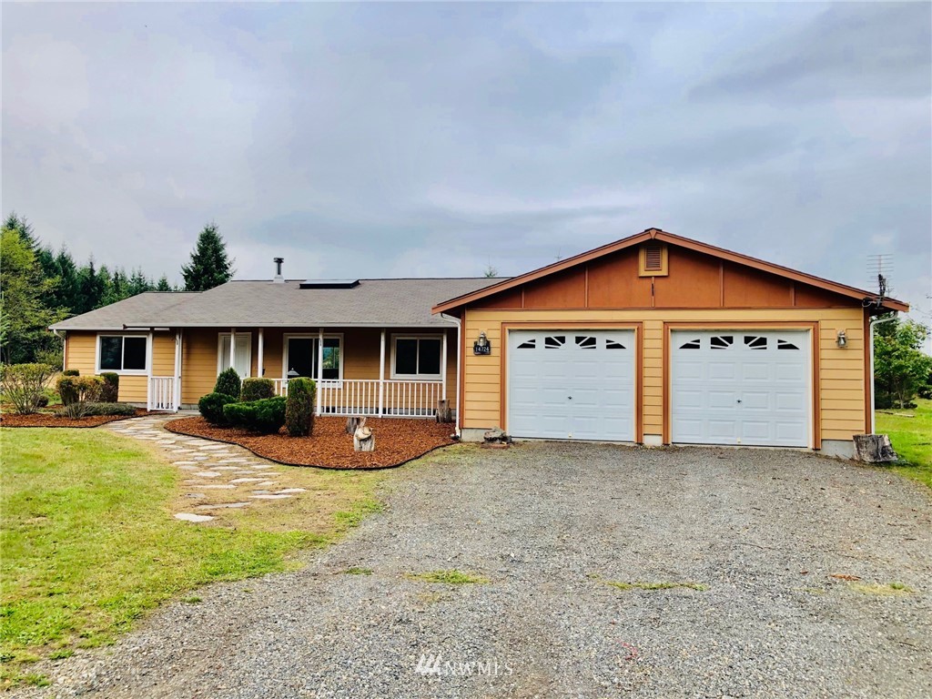 14724 Mima Road Southwest Olympia, WA 98512 - Photo 1 of 14 a view of a house with a yard