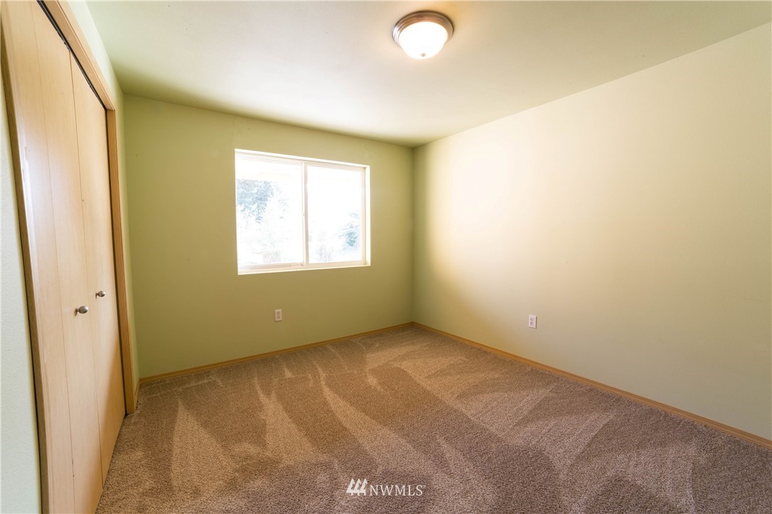 14724 Mima Road Southwest Olympia, WA 98512 - Photo 10 of 14 an empty room with a window
