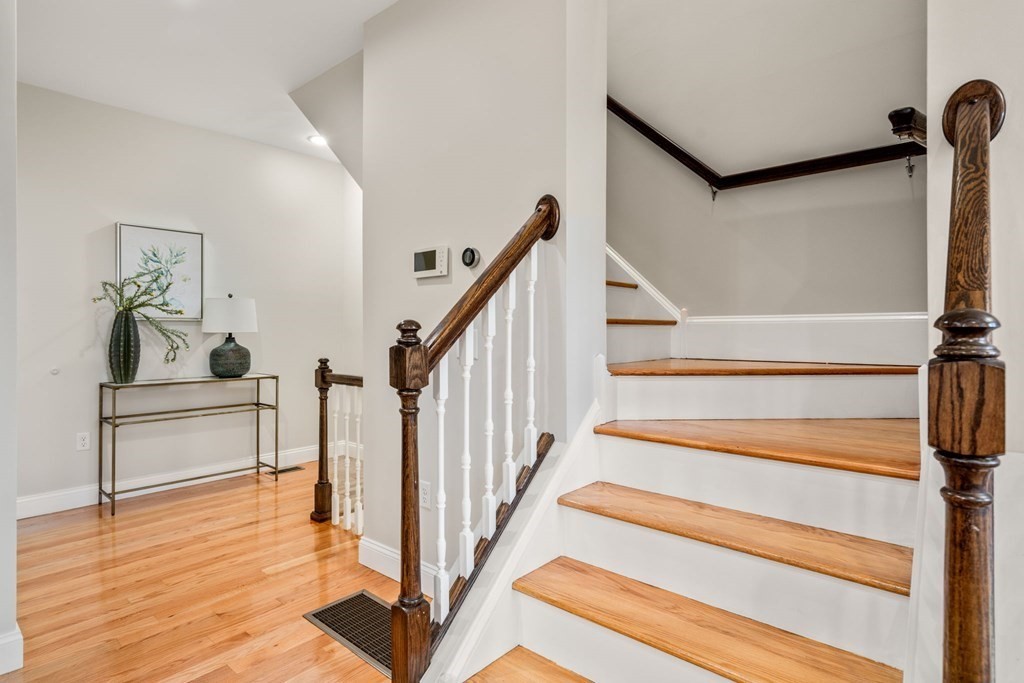 375 Border Street, Unit 375 Boston, MA 02128 - Photo 11 of 34 a view of entryway and hall with wooden floor