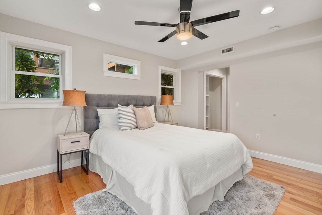 375 Border Street, Unit 375 Boston, MA 02128 - Photo 15 of 34 a bedroom with a bed and a window