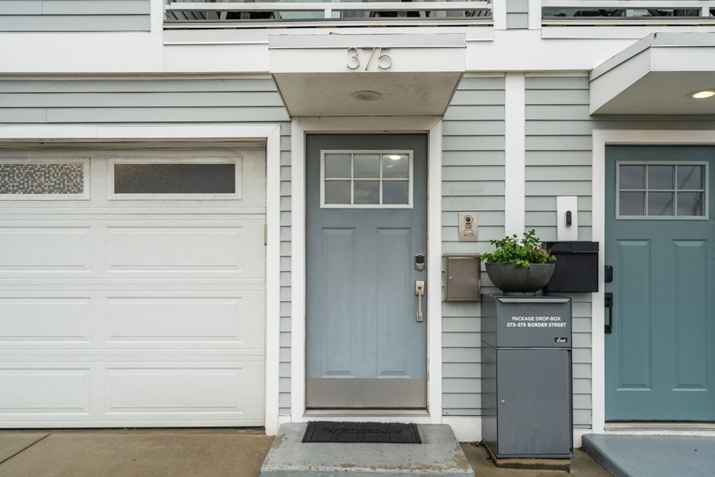 375 Border Street, Unit 375 Boston, MA 02128 - Photo 29 of 34 a potted plant sitting on the side of a door