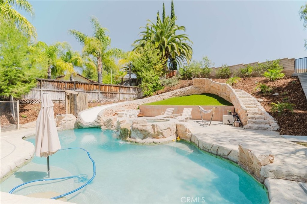 32480 The Old Road Castaic, CA 91384 - Photo 57 of 68 a swimming pool with outdoor seating and yard