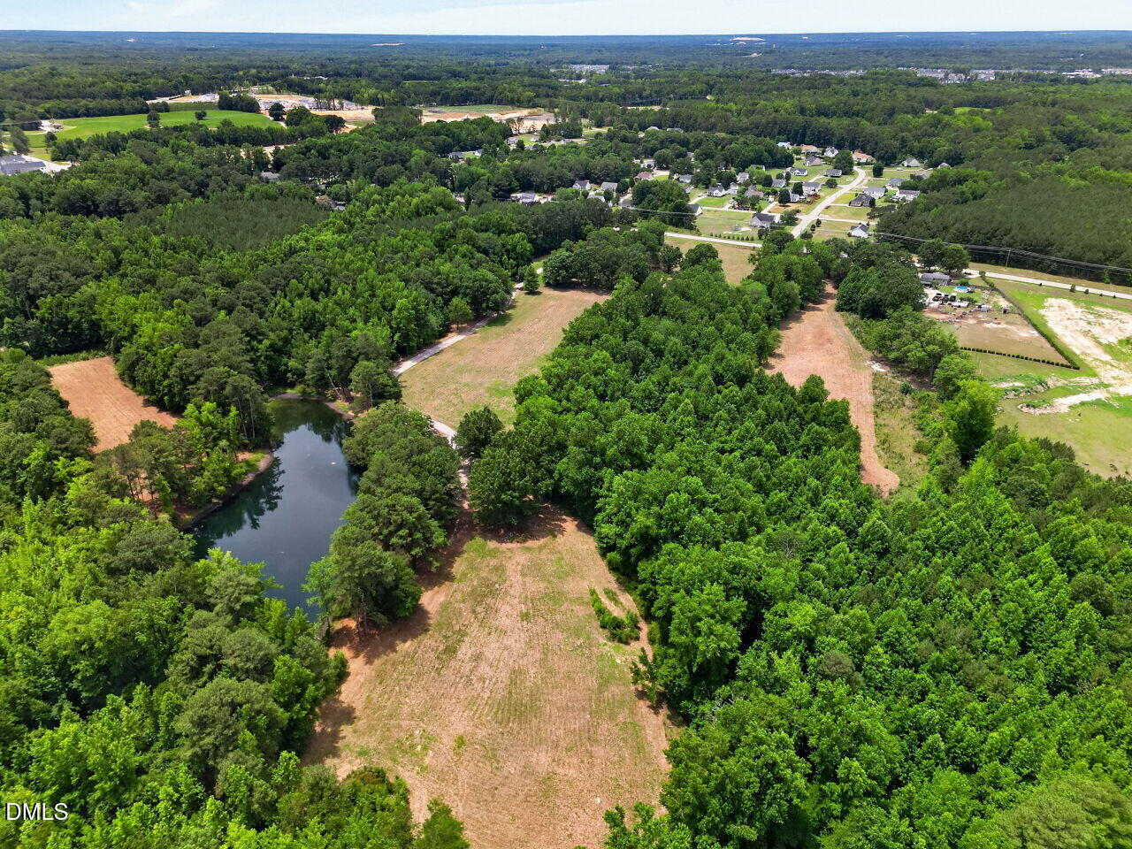 1217 Eagle Rock Road Wendell, NC 27591 - Photo 13 of 17 an aerial view of residential houses with outdoor space and trees