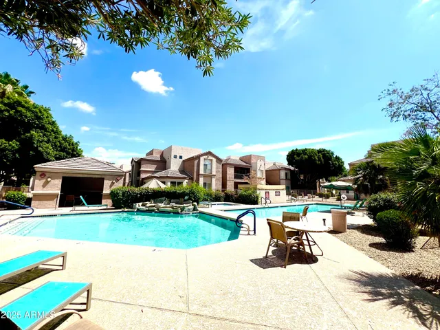 a view of a street with cars