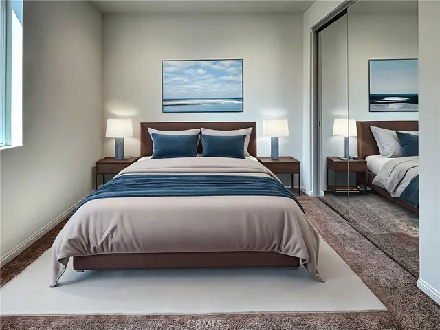 a bedroom with bed and window