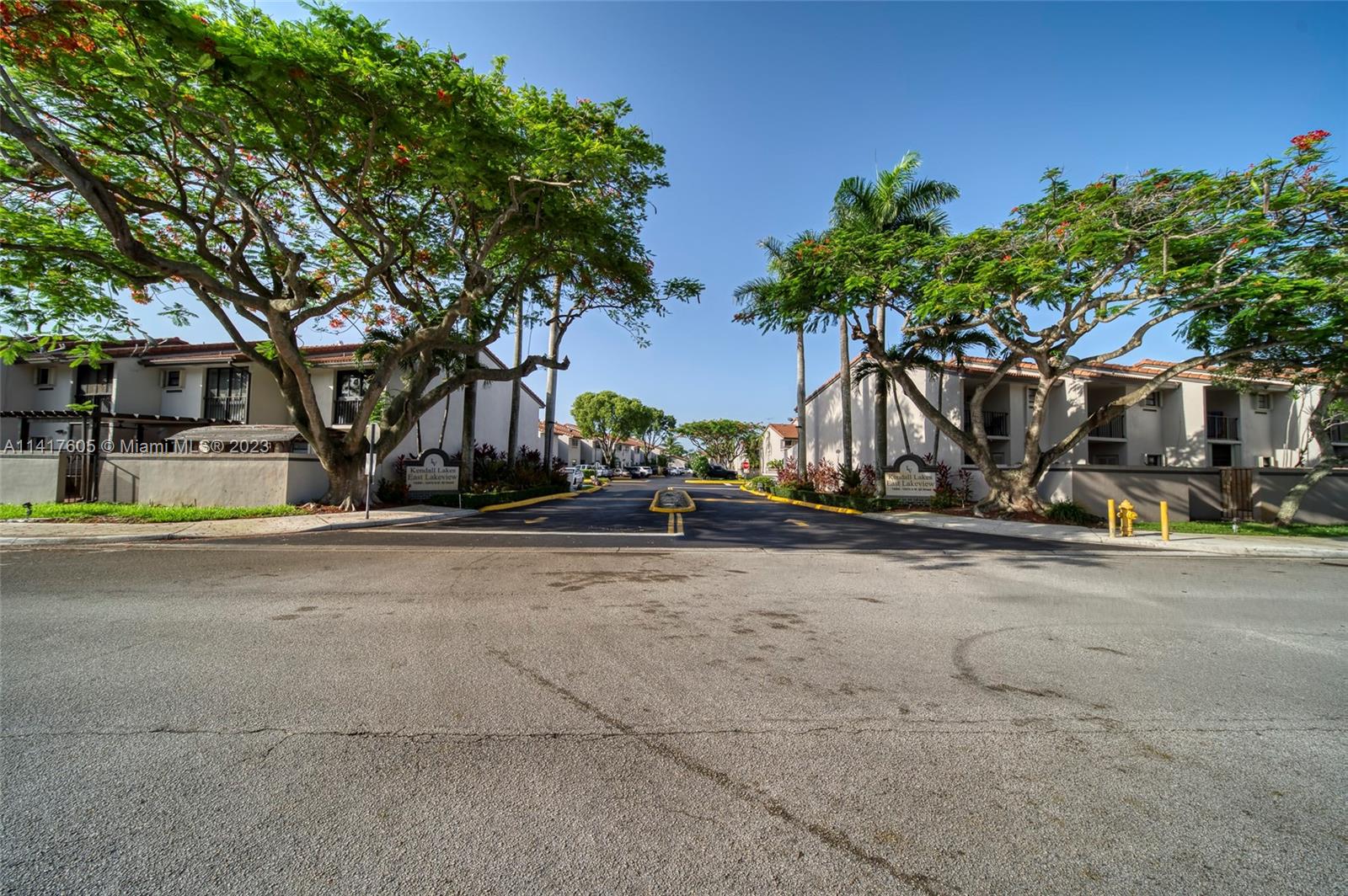 13440 Southwest 62nd Street, Unit G101 Miami, FL 33183 - Photo 24 of 25 front view of a house with a street