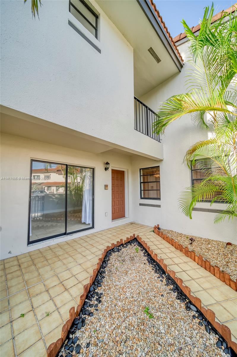 13440 Southwest 62nd Street, Unit G101 Miami, FL 33183 - Photo 6 of 25 front view of a house