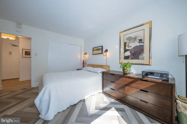 a bedroom with a bed and furniture