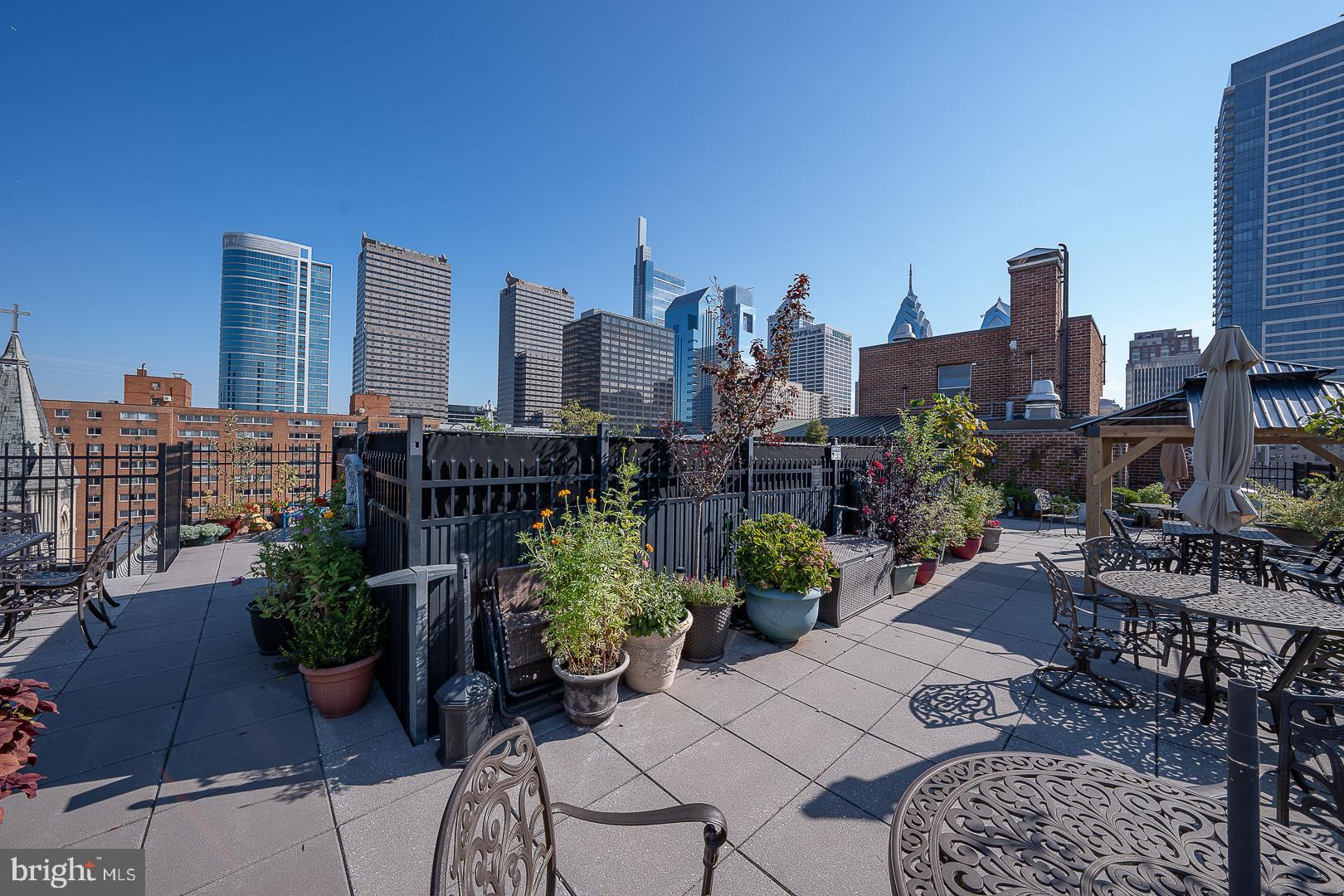 118 South 21st Street, Unit 31112 Philadelphia, PA 19103 - Photo 22 of 26 a view of a city with furniture