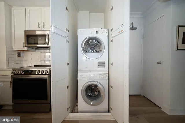 a view of washer and dryer in a utility room