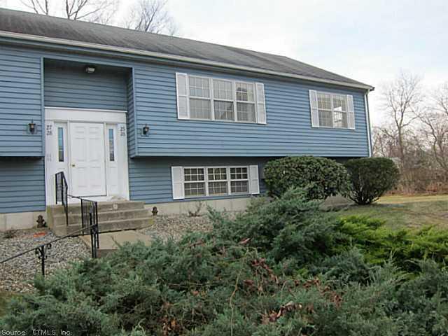 25 Founders Village, Unit 25 Clinton, CT 06413 - Photo 1 of 1 a front view of a house with plants