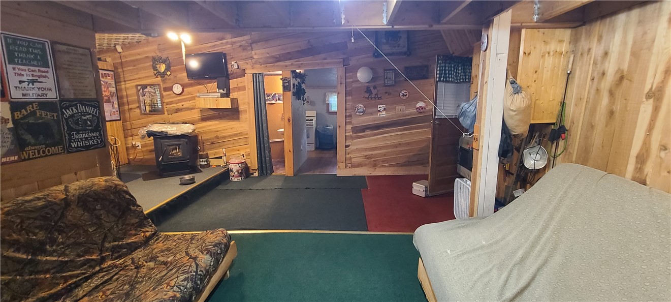 2446 Red Fox Road Portville, NY 14770 - Photo 18 of 41 living room with 2 futons
