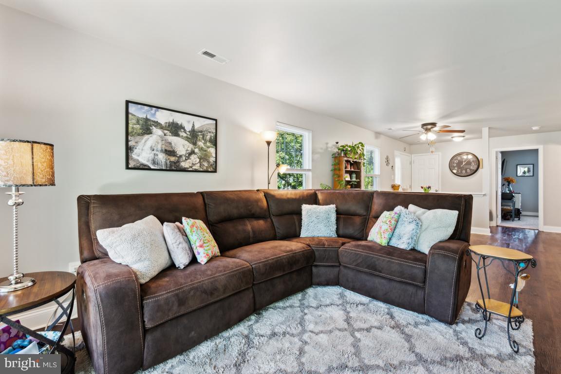 1009 Squirrel Road Marlton, NJ 08053 - Photo 14 of 29 a living room with furniture and kitchen view