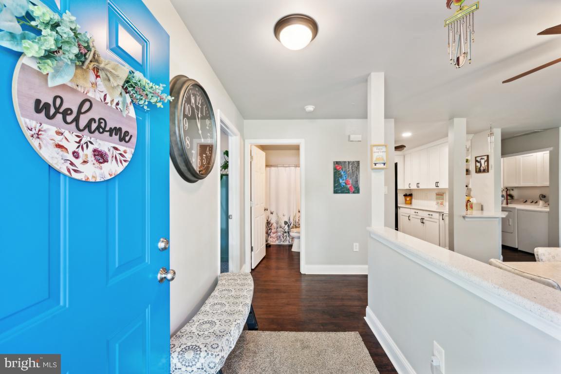 1009 Squirrel Road Marlton, NJ 08053 - Photo 3 of 29 a view of a hallway with wooden floor