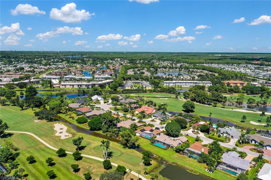 167 Torrey Pines Point Naples, FL 34113 - Photo 35 of 37 an aerial view of a city