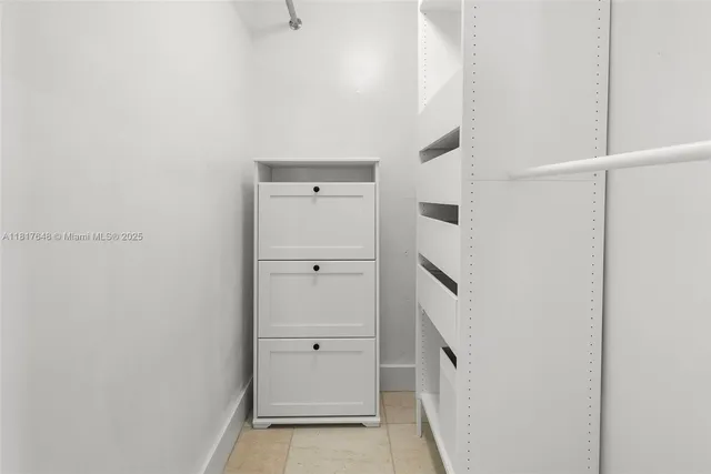 a view of an empty walk in closet