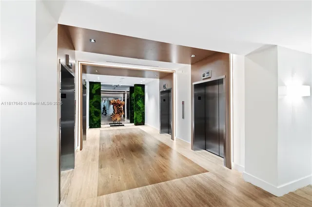 a view of gallery with wooden floor