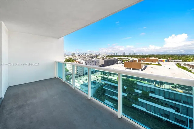 a view of a balcony with an ocean