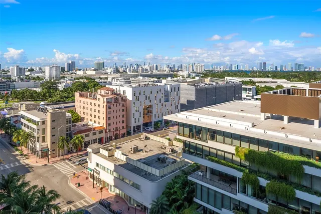 a view of a city with tall buildings