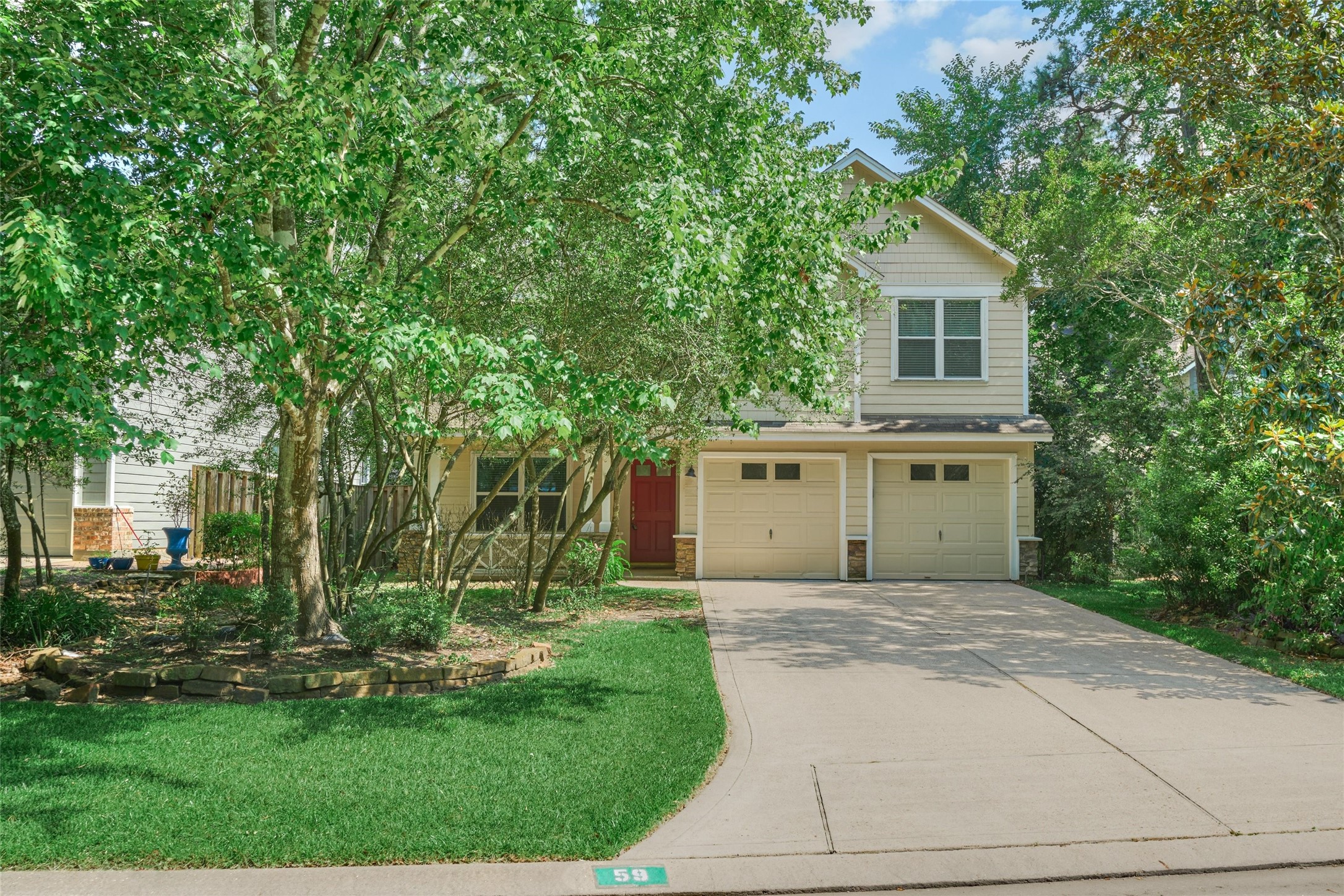 59 West Gaslight Place Spring, TX 77382 - Photo 3 of 47 Double wide driveway with two car garage.