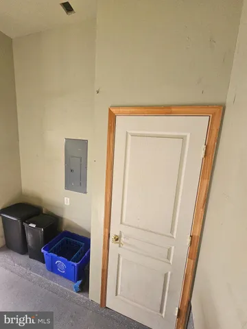 a view of a park with iron fence