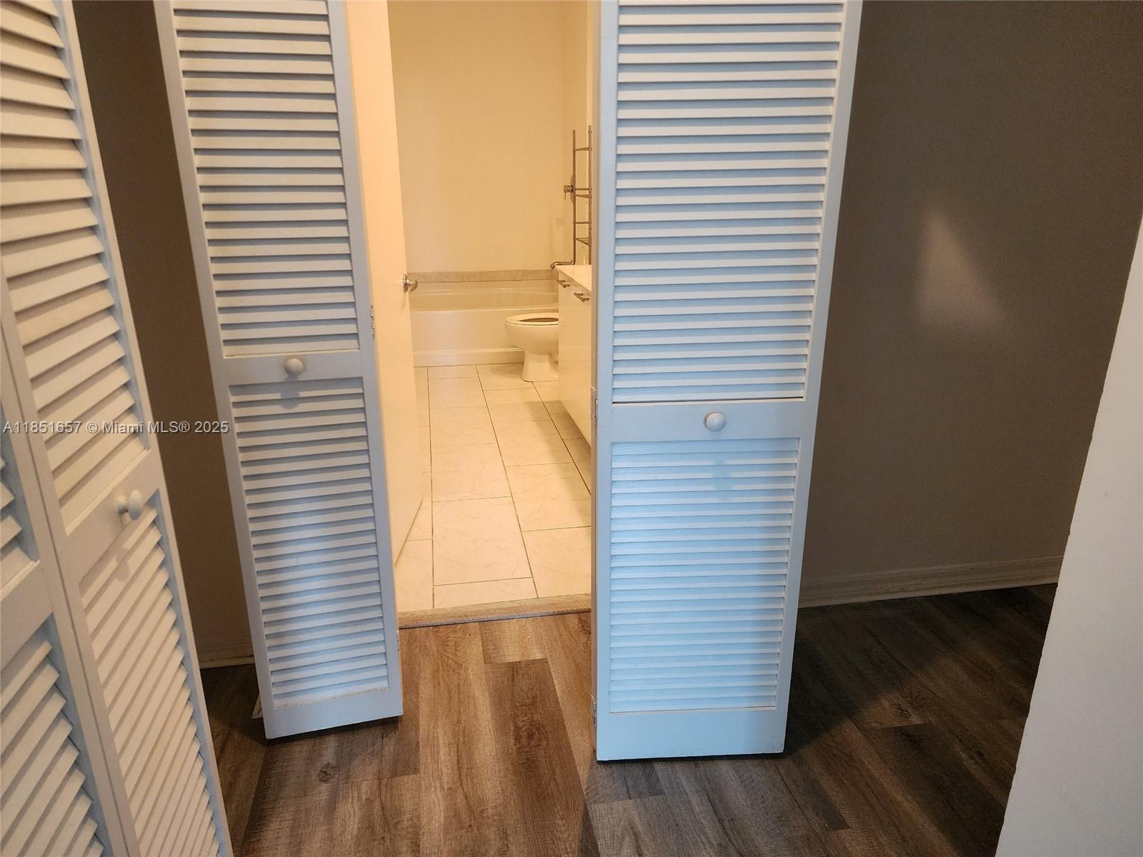 951 Brickell Avenue, Unit 1007 Miami, FL 33131 - Photo 20 of 25 a view of entryway with wooden floor