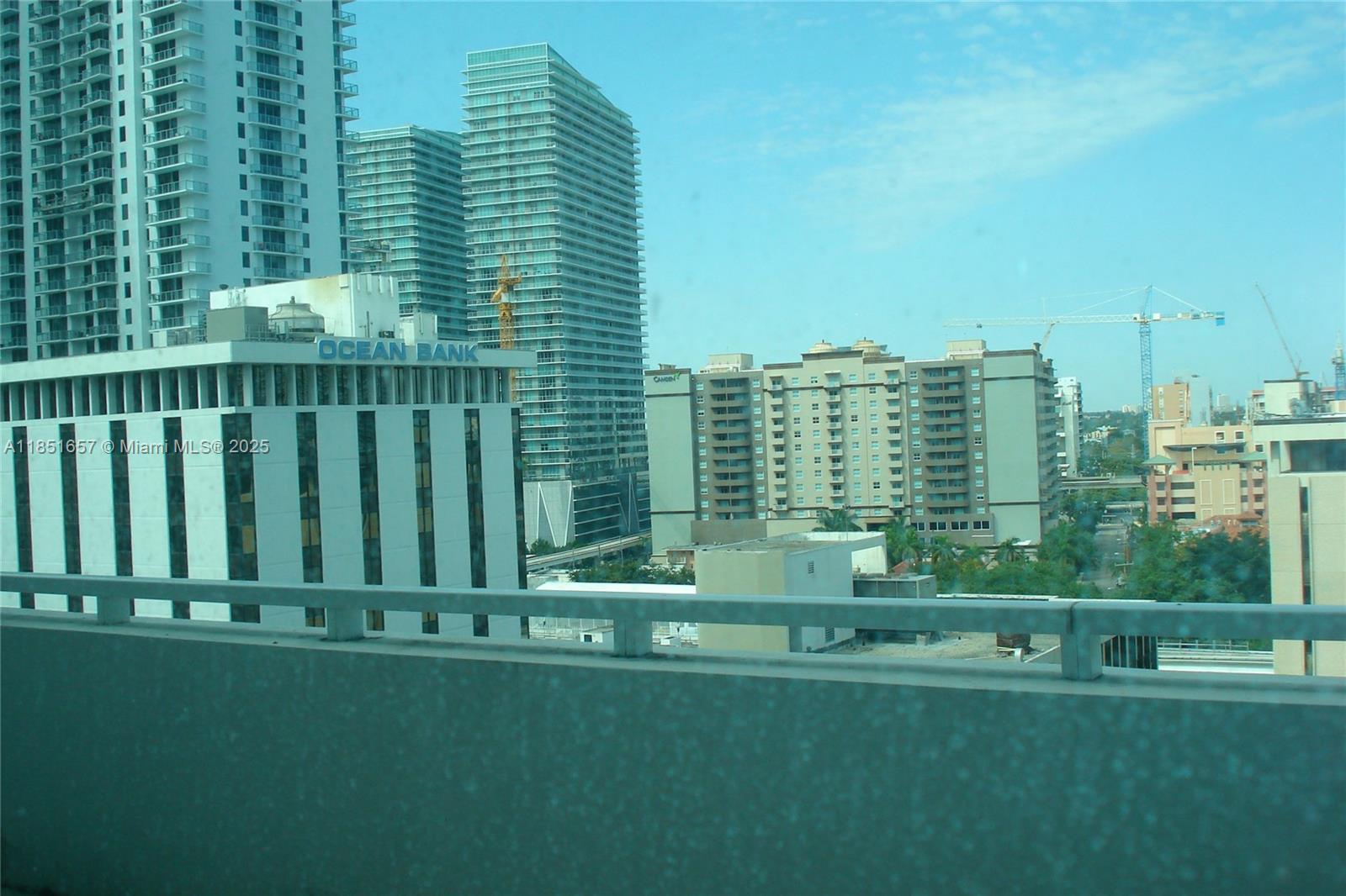 951 Brickell Avenue, Unit 1007 Miami, FL 33131 - Photo 5 of 25 a view of a city from a balcony