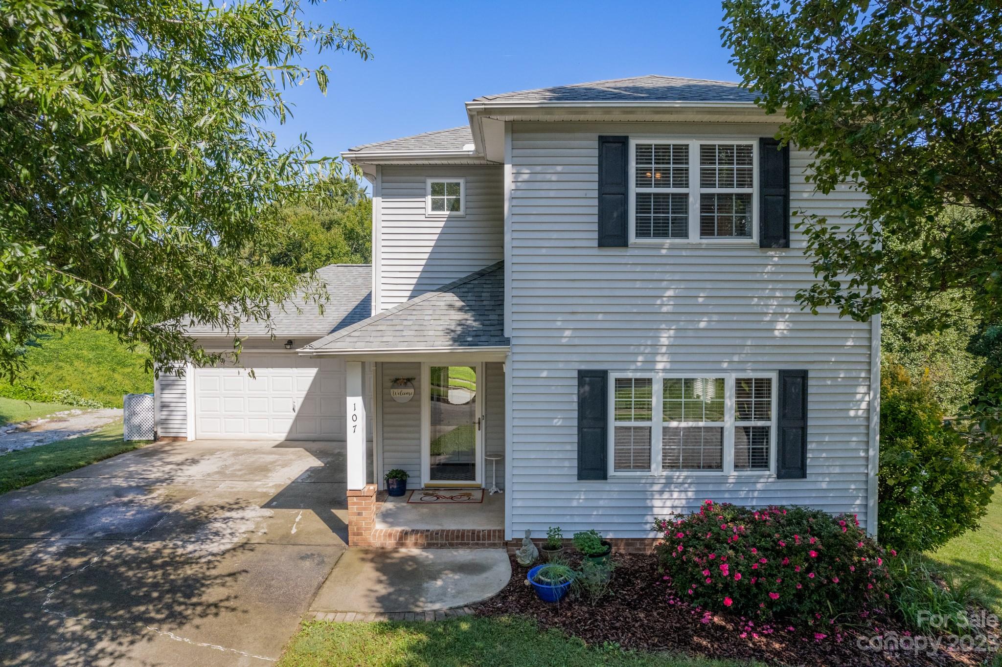 front view of a house with a yard