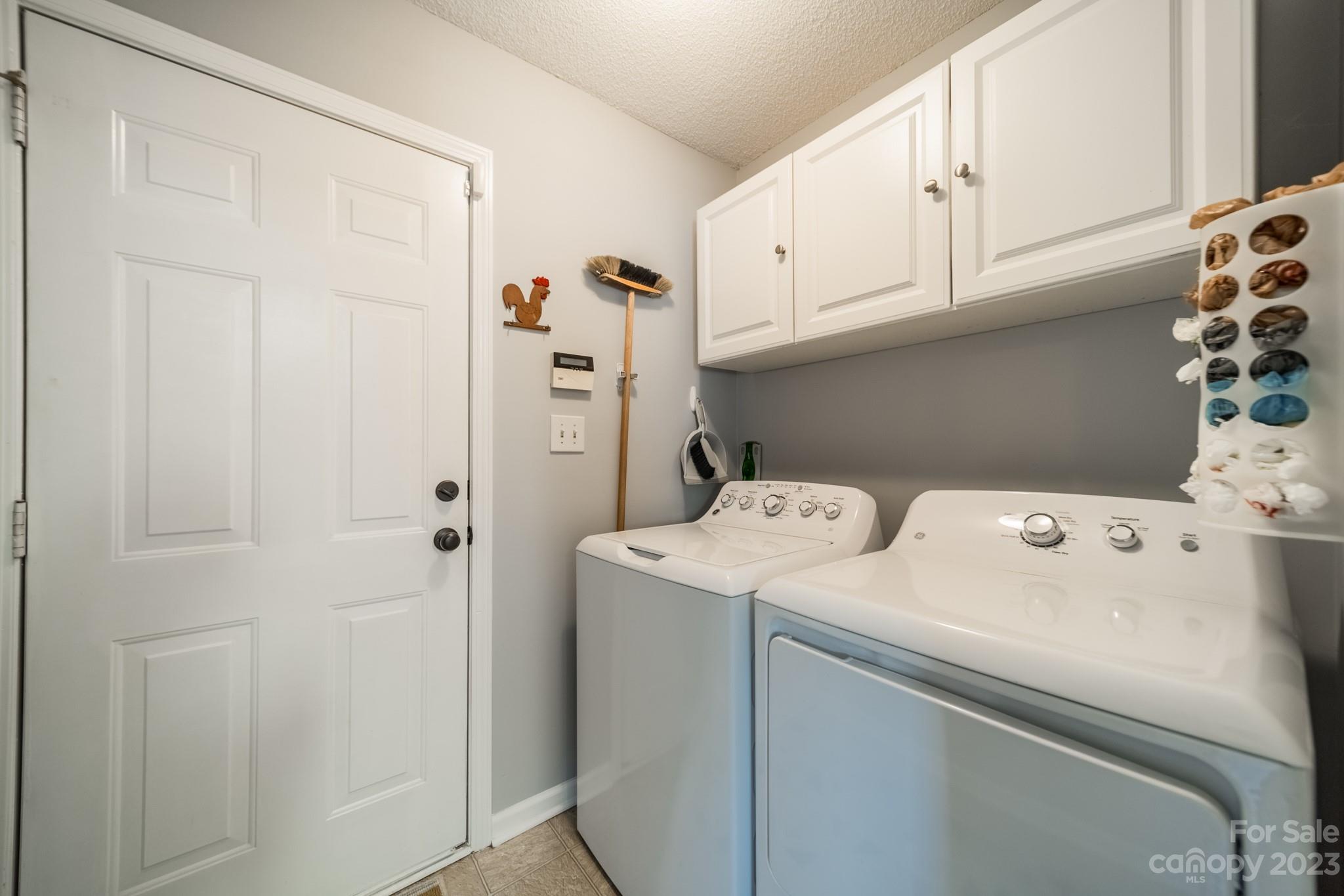 107 Howe Street Belmont, NC 28012 - Photo 13 of 35 a utility room with dryer and washer
