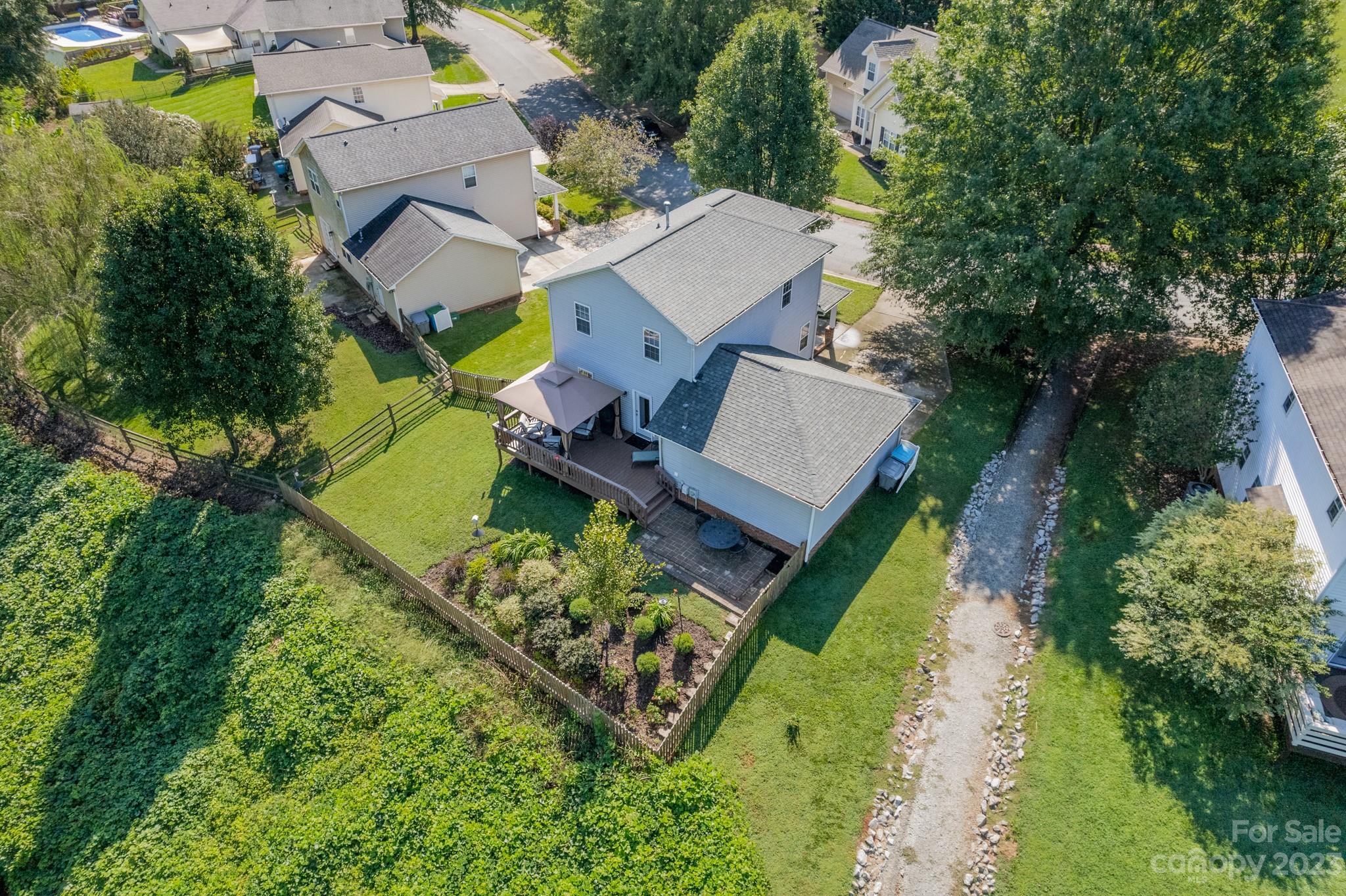 107 Howe Street Belmont, NC 28012 - Photo 33 of 35 an aerial view of a house with a garden