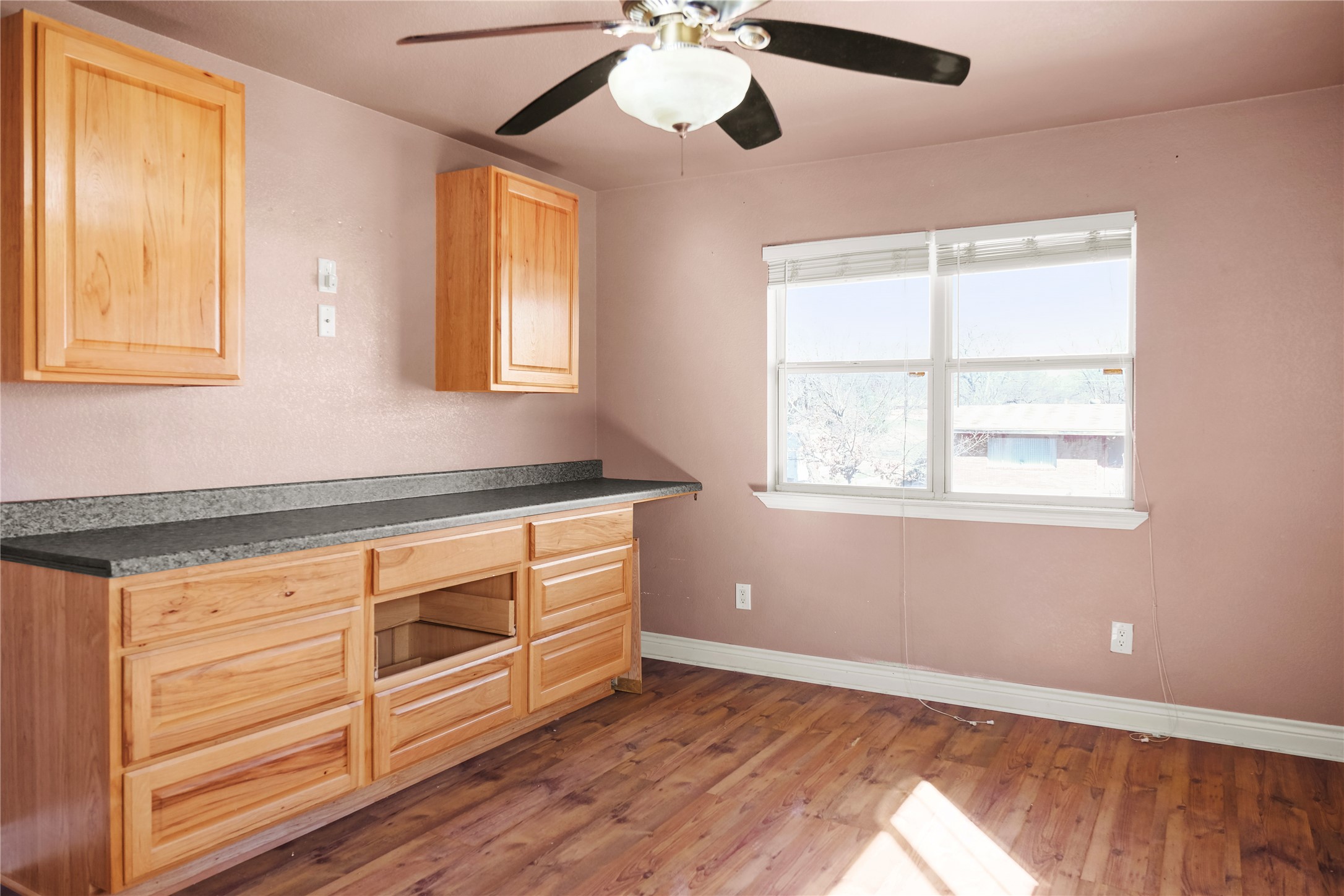 3300 Lake Inks Avenue Killeen, TX 76543 - Photo 20 of 32 a view of a kitchen with wooden cabinet and a window