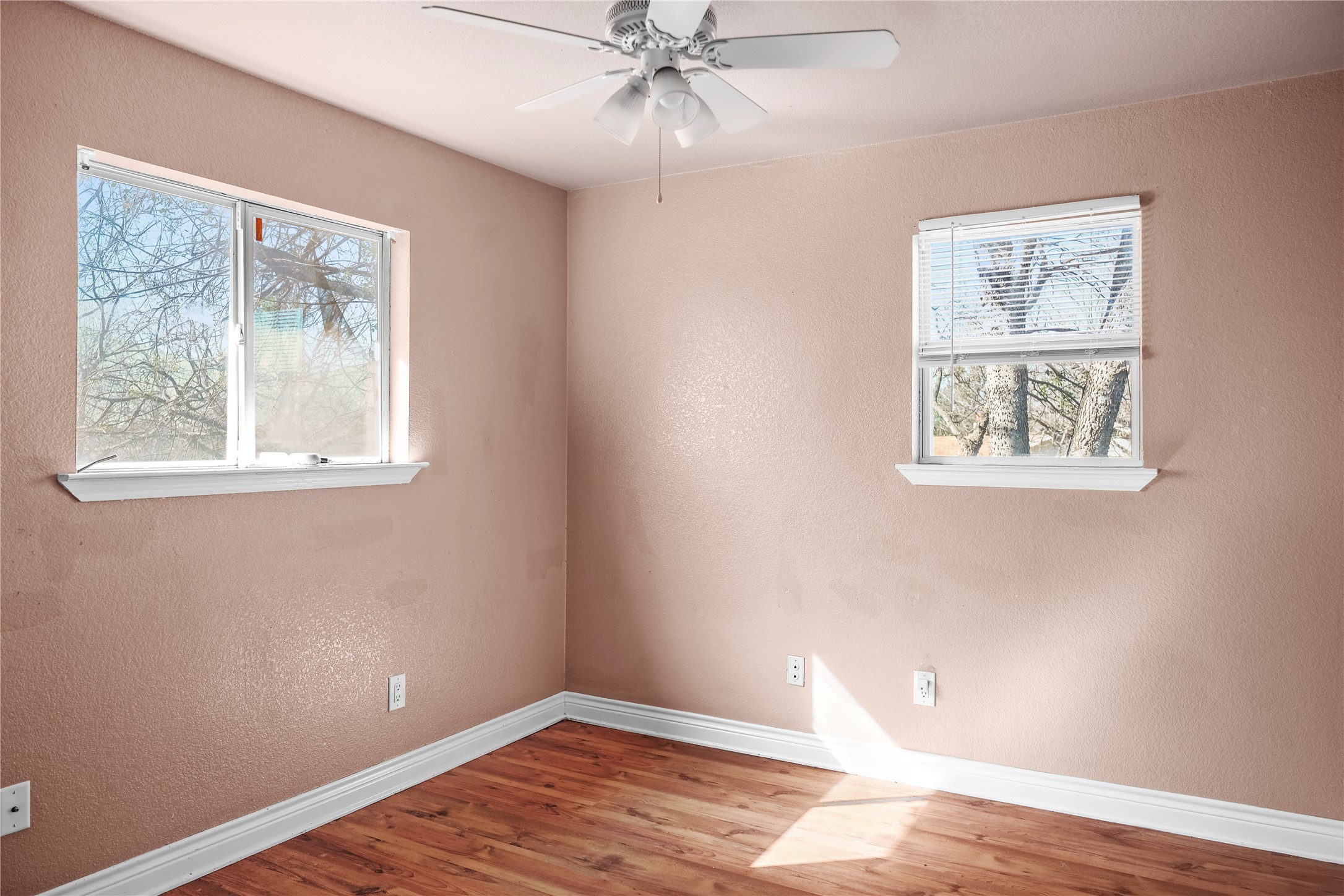 3300 Lake Inks Avenue Killeen, TX 76543 - Photo 25 of 32 a view of an empty room with wooden floor and a window