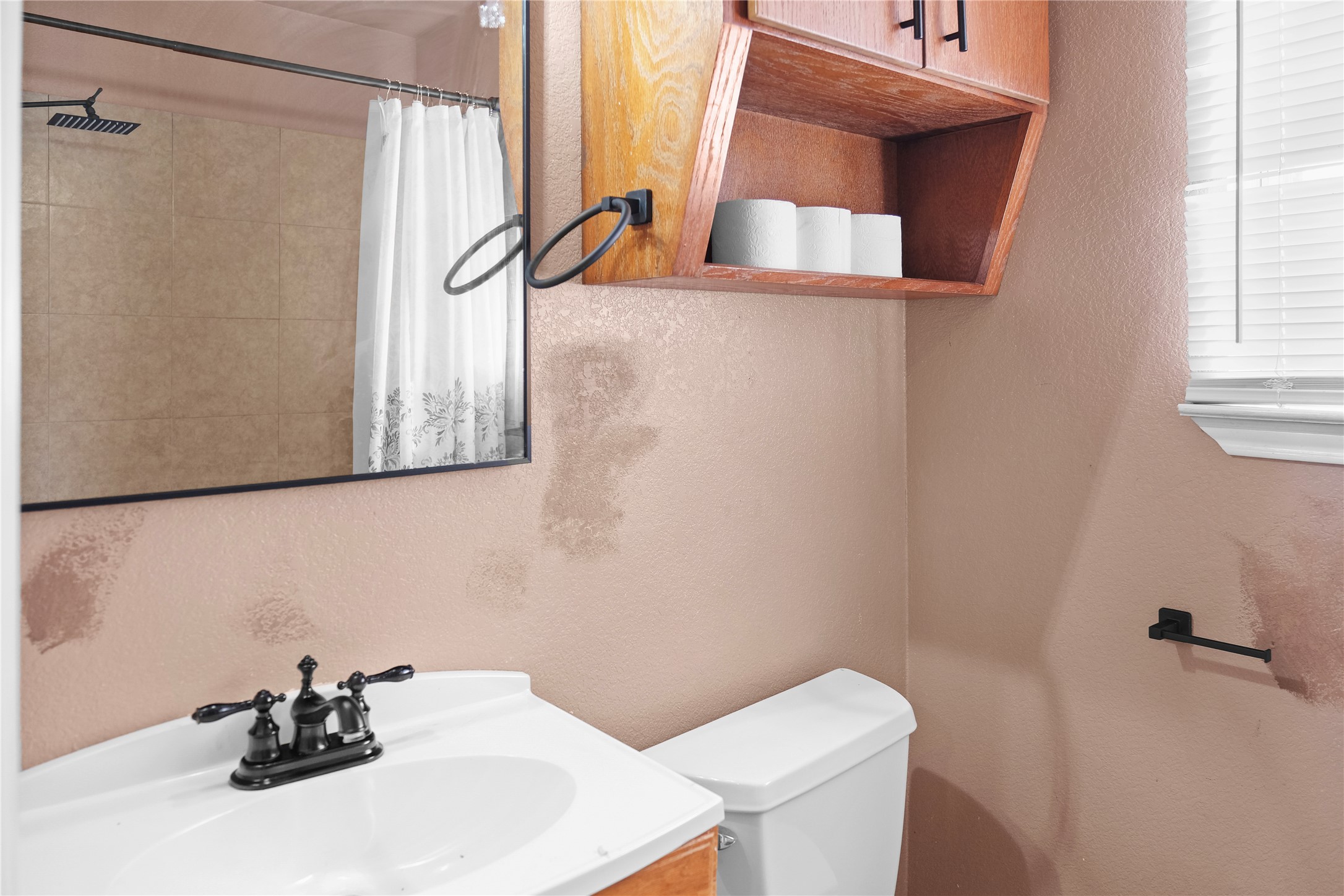 3300 Lake Inks Avenue Killeen, TX 76543 - Photo 26 of 32 a bathroom with a sink toilet and shower
