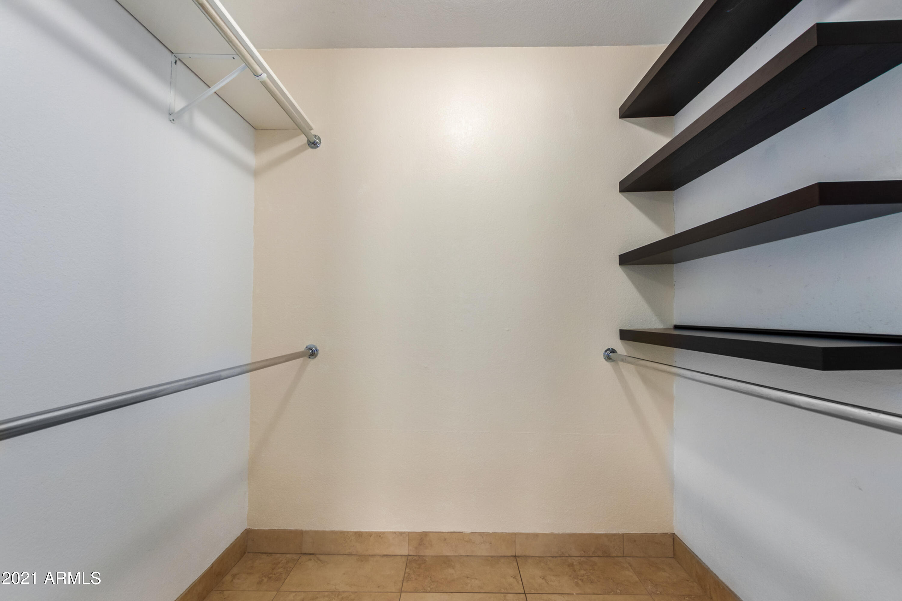 700 East Mesquite Circle, Unit R123 Tempe, AZ 85288 - Photo 12 of 28 a view of walk in closet