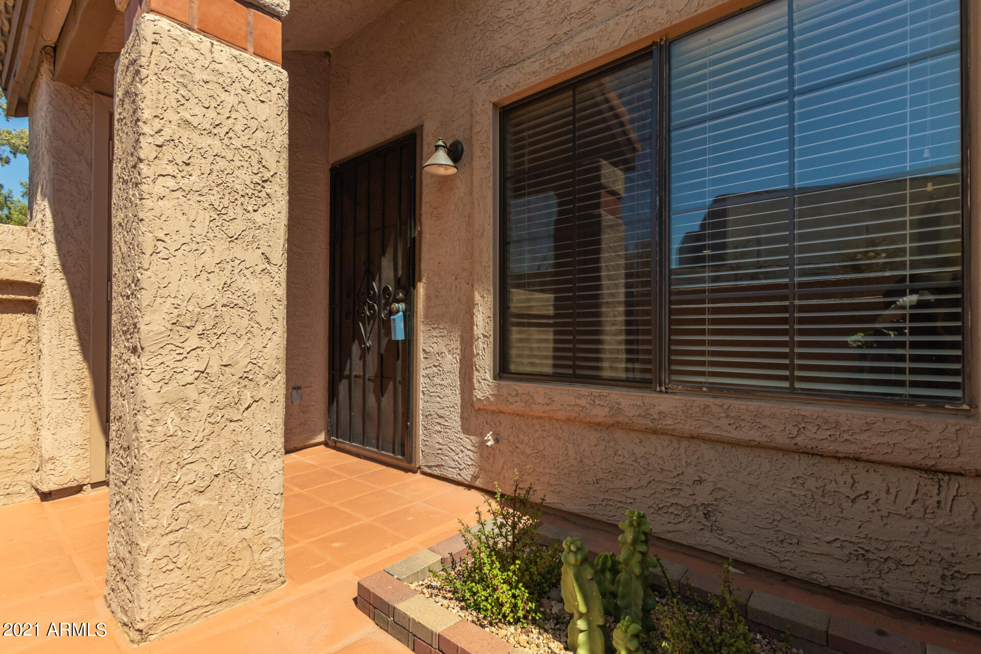 700 East Mesquite Circle, Unit R123 Tempe, AZ 85288 - Photo 16 of 28 a bathroom with a granite countertop sink and a mirror