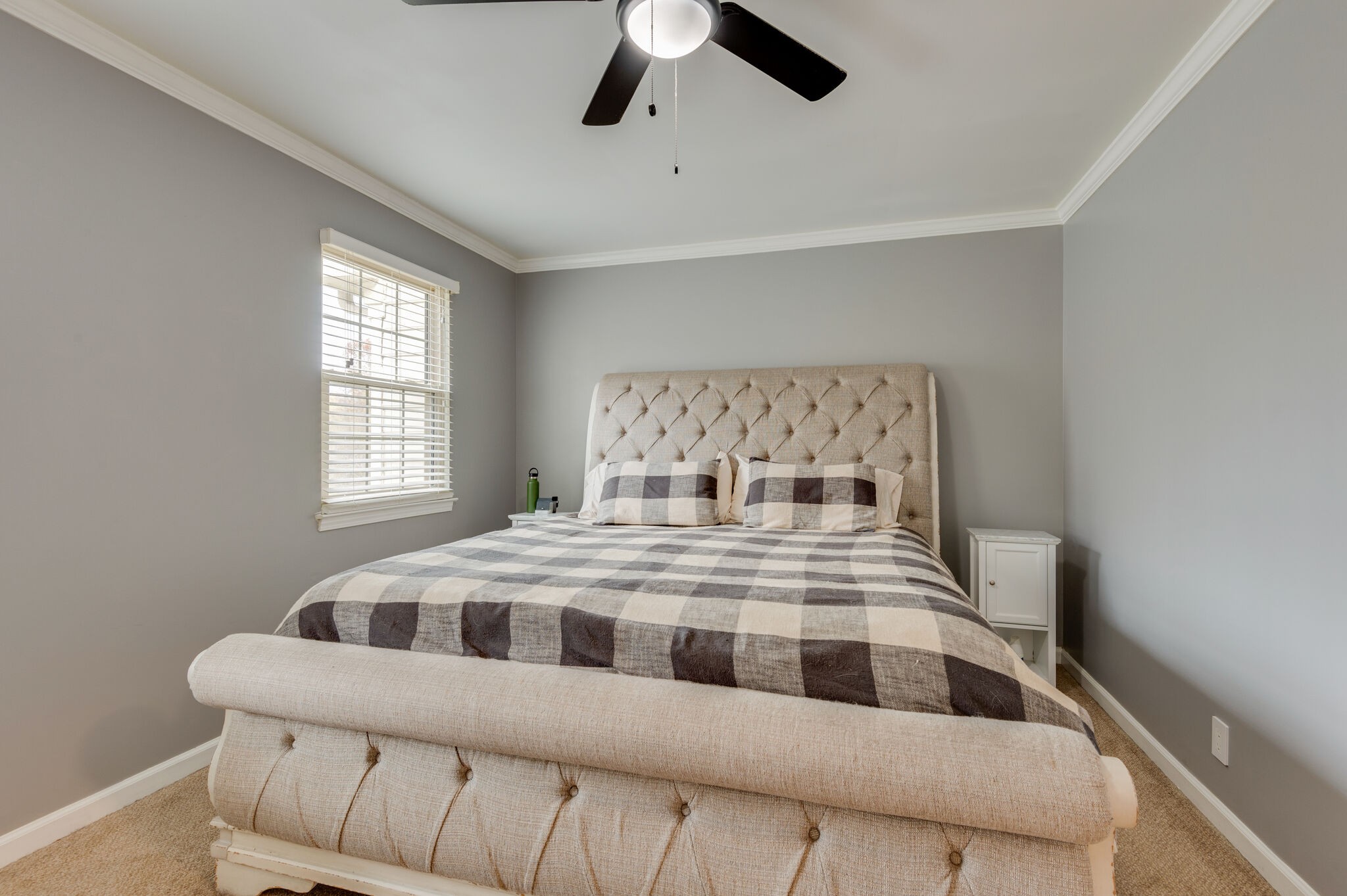 1368 General George Patton Road Nashville, TN 37221 - Photo 14 of 30 a bedroom with a bed and a large window