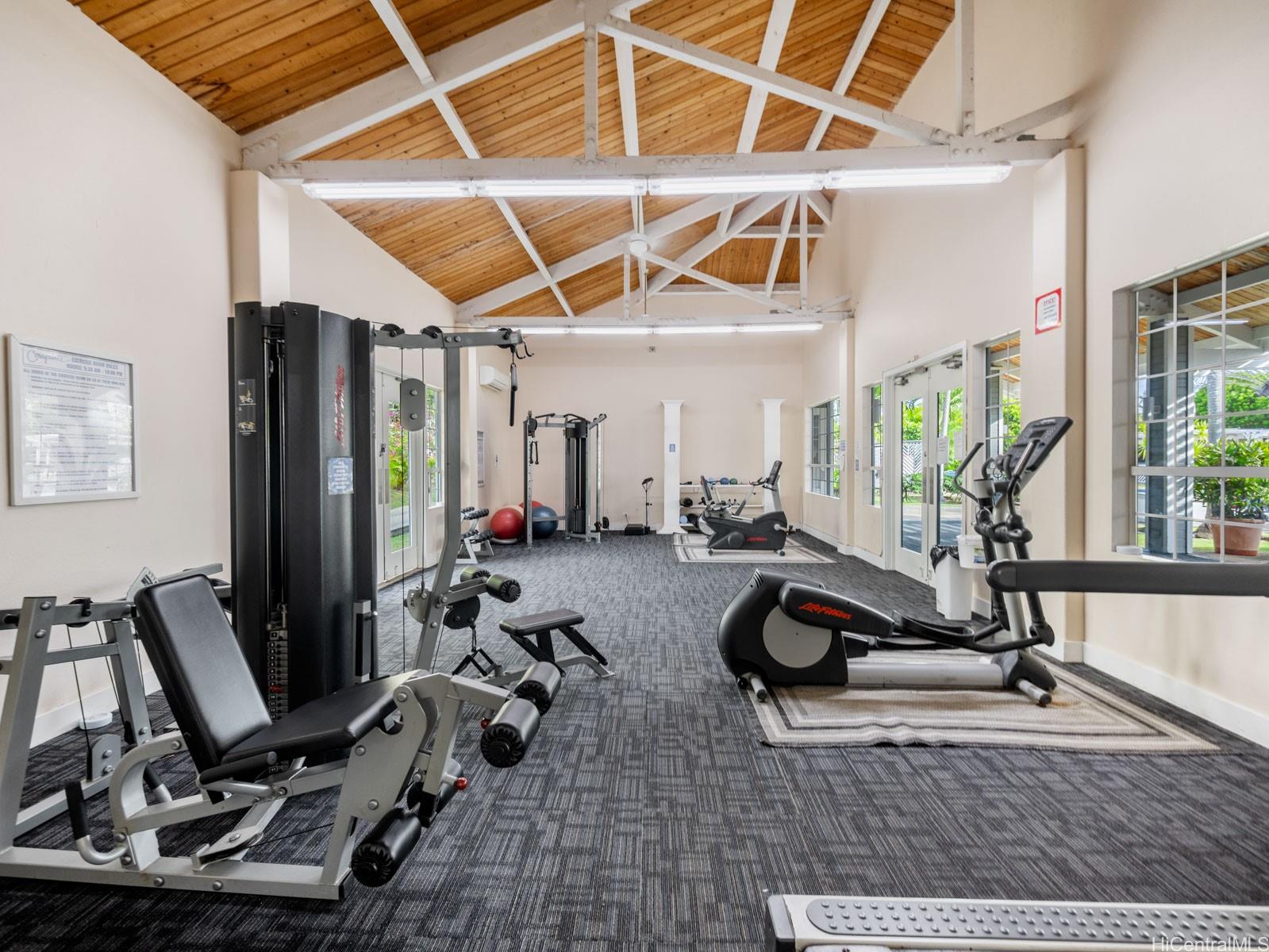 594 Mananai Place, Unit 21T Honolulu, HI 96818 - Photo 24 of 25 a view of a room with gym equipment