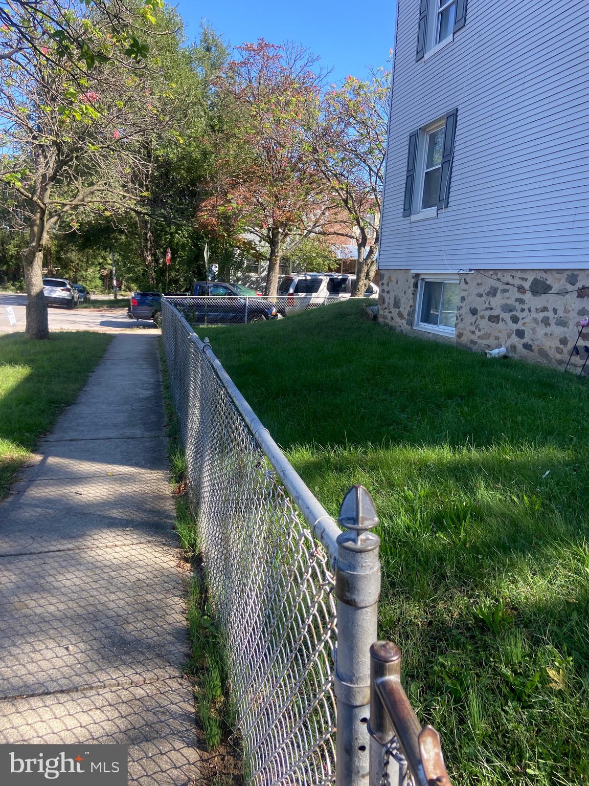 501 Baltic Avenue, Unit 1 Baltimore, MD 21225 - Photo 3 of 8 a balcony with view of trees in the background