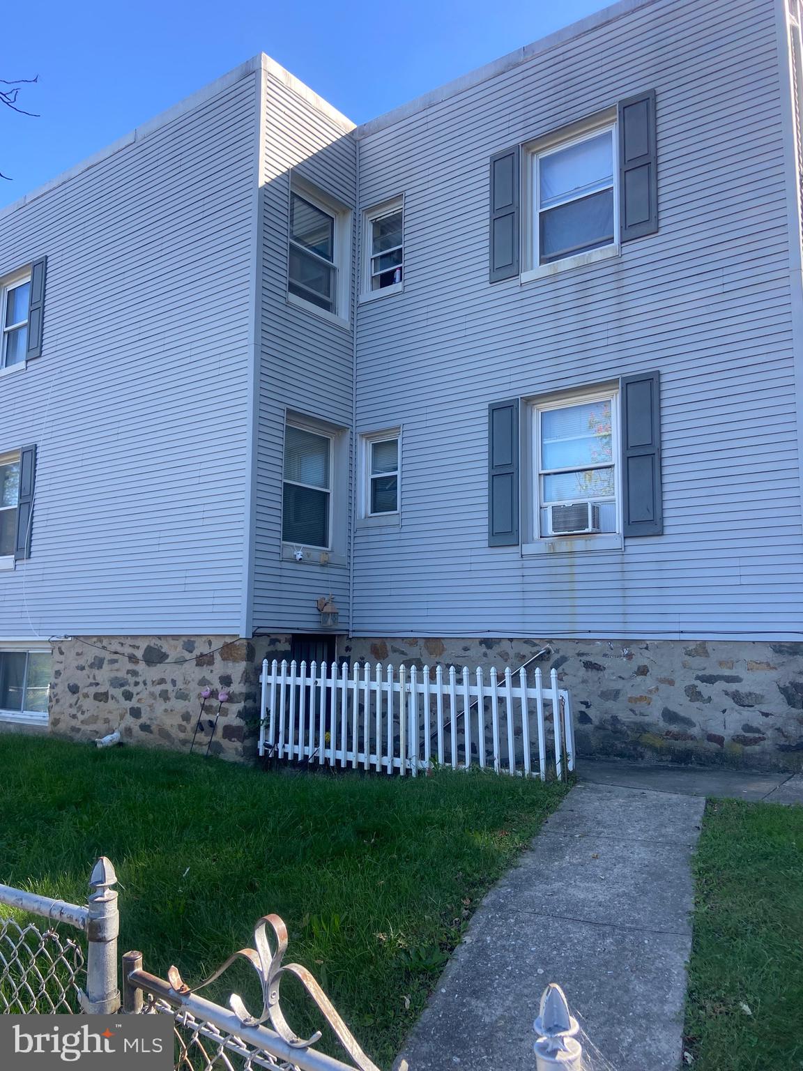 501 Baltic Avenue, Unit 1 Baltimore, MD 21225 - Photo 4 of 8 a view of a house with a yard